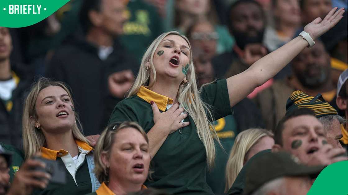 A Springbok supporter singing the national anthem. A Springbok supporter singing the national anthem.