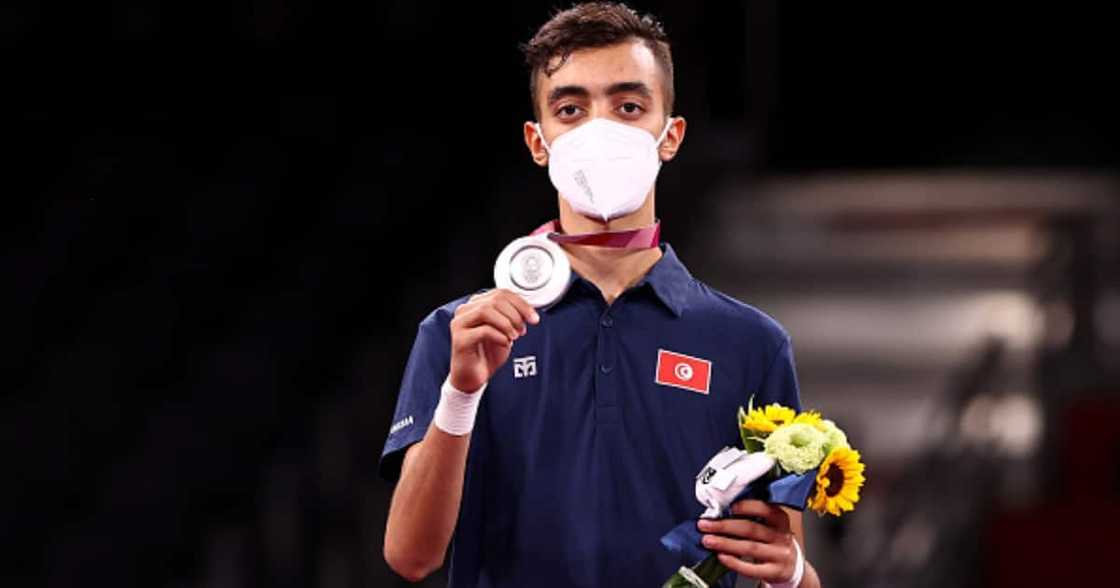 Silver medalist Mohamed Khalil Jendoubi of Team Tunisia poses with the silver medal for the Men's -58kg Taekwondo Gold Medal at Makuhari Messe Hall on July 24, 2021 in Chiba, Japan. Photo by Maja Hitij/Getty Images. Silver medalist Mohamed Khalil Jendoubi of Team Tunisia poses with the silver medal for the Men's -58kg Taekwondo Gold Medal at Makuhari Messe Hall on July 24, 2021 in Chiba, Japan. Photo by Maja Hitij/Getty Images.