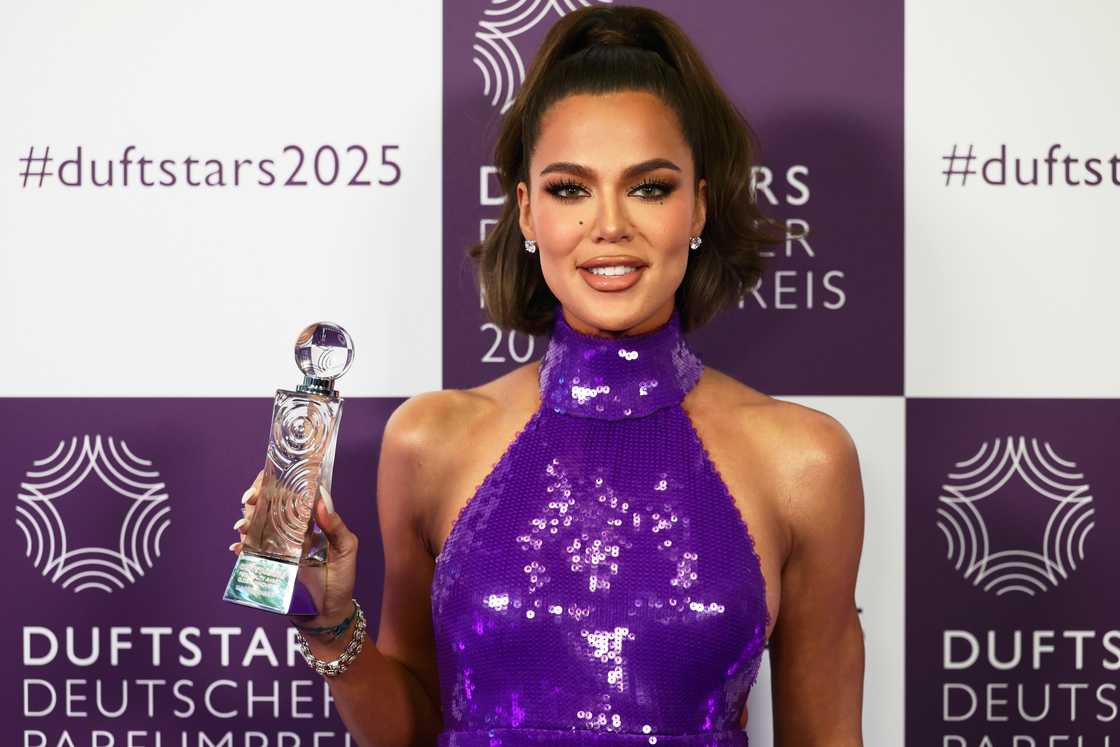 Khloé Kardashian poses with the award at the annual German Perfume Award Duftstars at Rheinterrasse in Duesseldorf, Germany