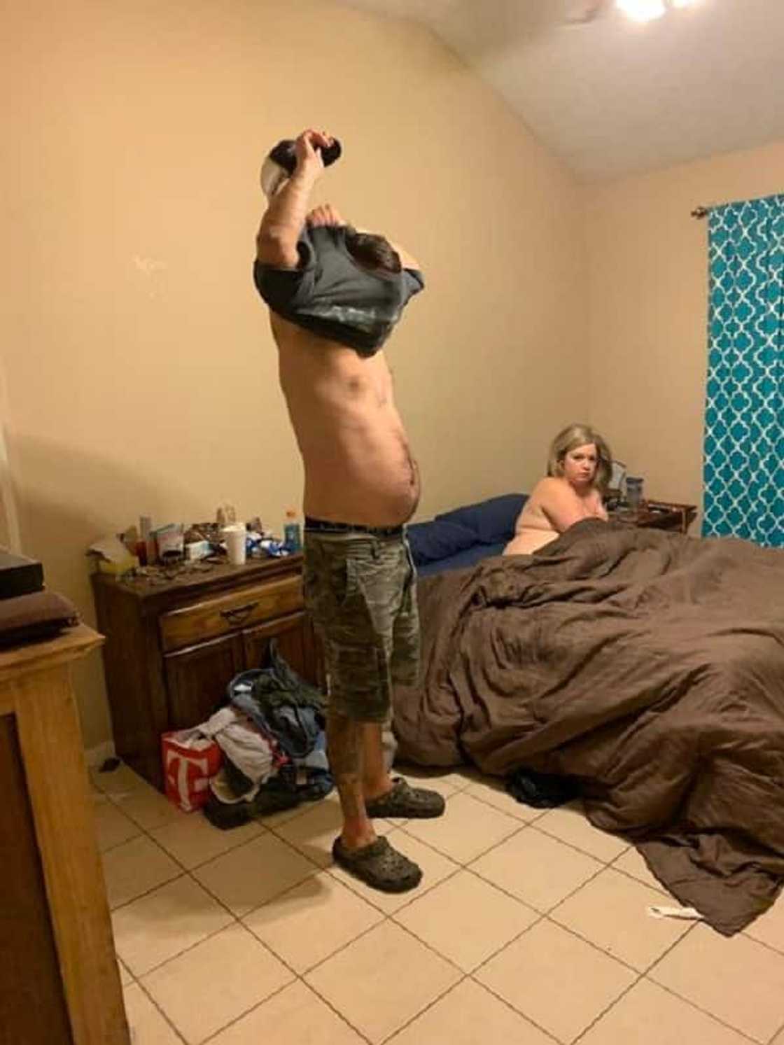 Man catches wife in bed with another man; shares their photos Man catches wife in bed with another man; shares their photos