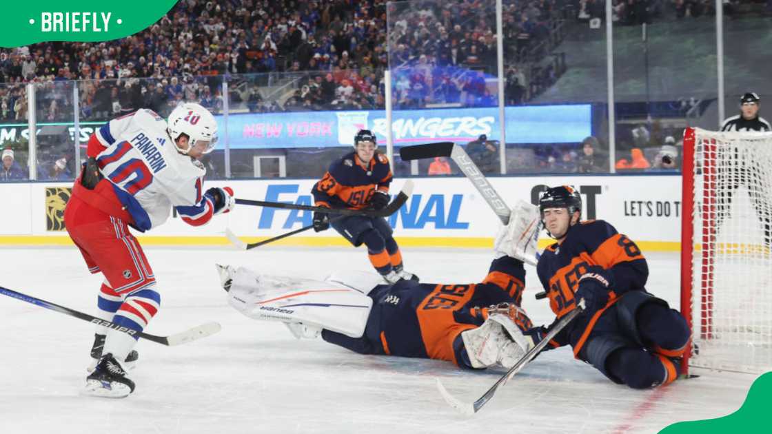 Artemi Panarin of the New York Rangers scores Artemi Panarin of the New York Rangers scores