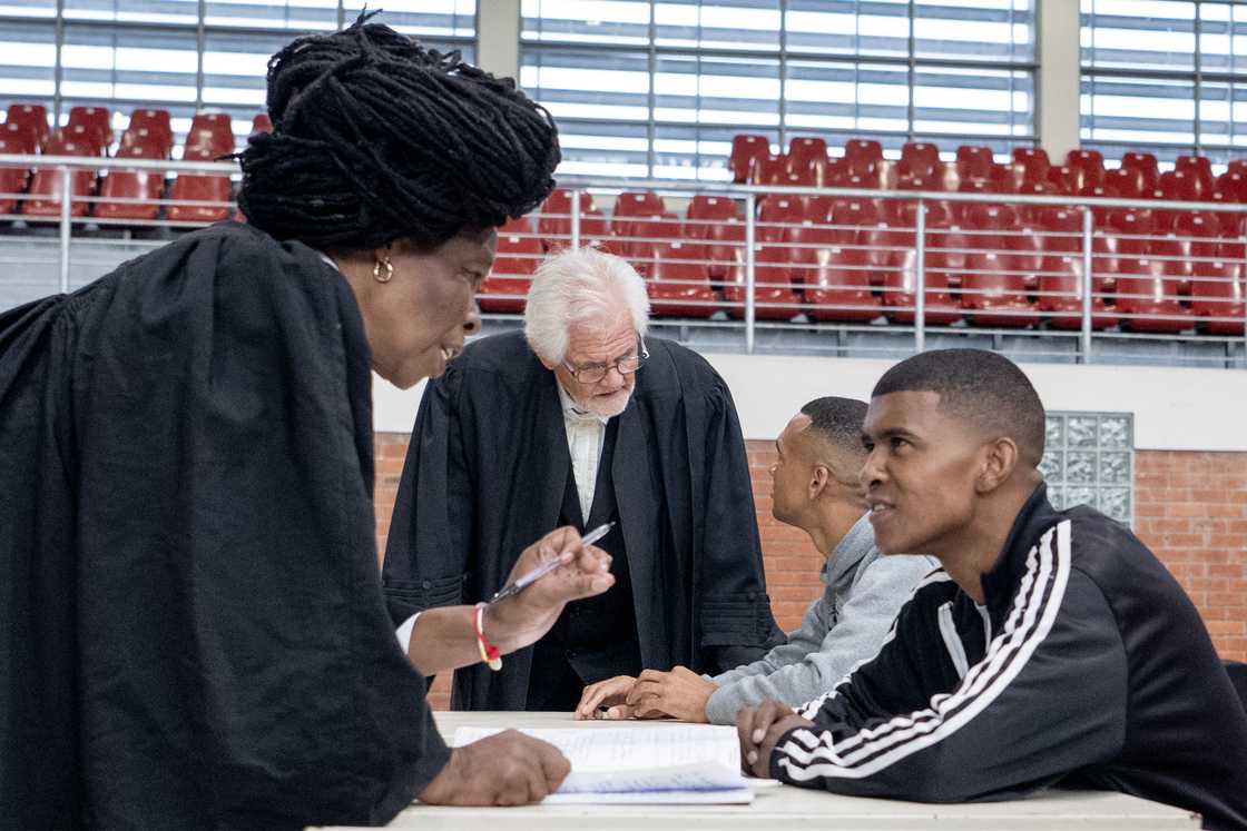 Advocate Nobahle Mkabayi talking to her client Steveno van Rhyn Advocate Nobahle Mkabayi talking to her client Steveno van Rhyn