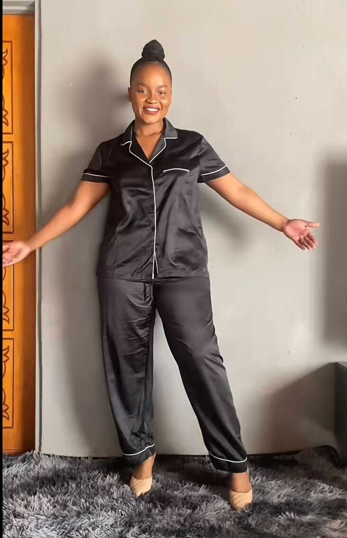 A woman in South Africa showcased Mr Price summer dresses.