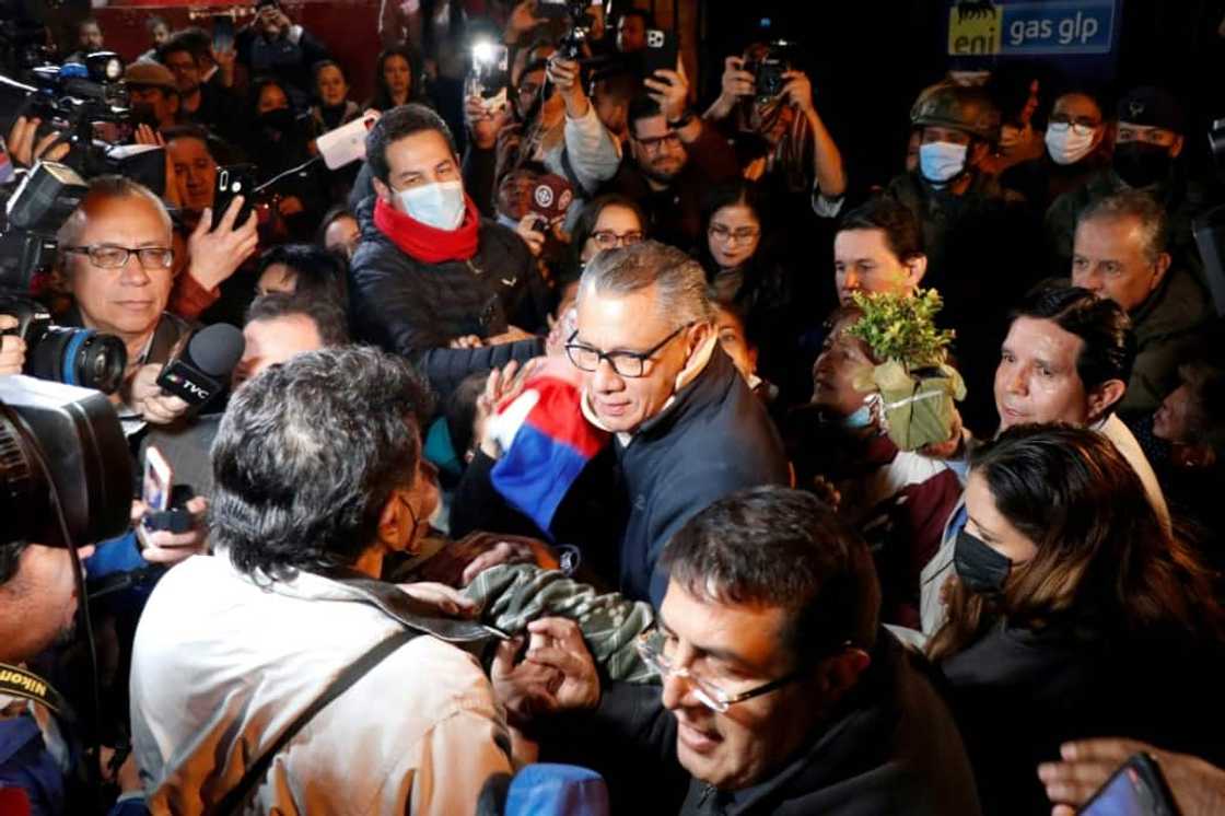 Ecuador's former vice president Jorge Glas, who was serving prison time for receiving bribes from Brazilian construction firm Odebrecht, is surrounded by reporters after his release from prison in Quito on November 28, 2022 Ecuador's former vice president Jorge Glas, who was serving prison time for receiving bribes from Brazilian construction firm Odebrecht, is surrounded by reporters after his release from prison in Quito on November 28, 2022