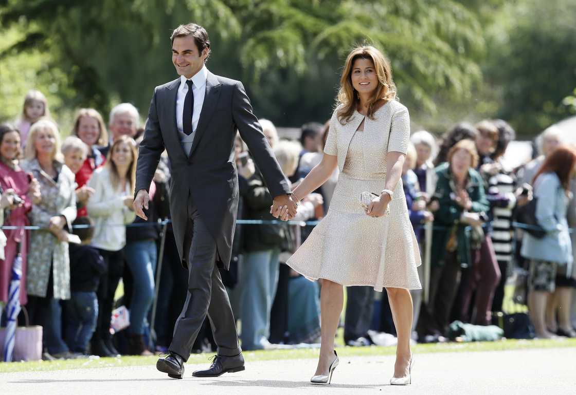 Roger Federer and his wife Mirka in Englefield, England. Roger Federer and his wife Mirka in Englefield, England.