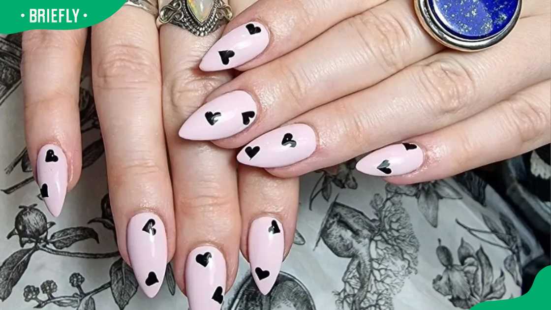 Blackhearts almond nail design