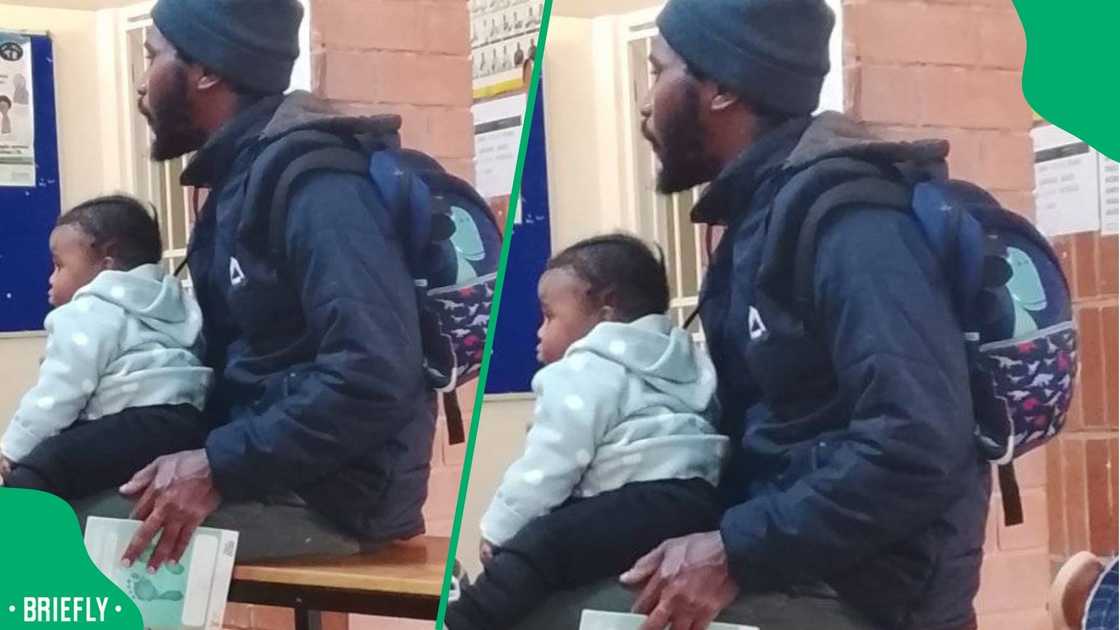 A father carrying his daughter on his touched many online A father carrying his daughter on his touched many online