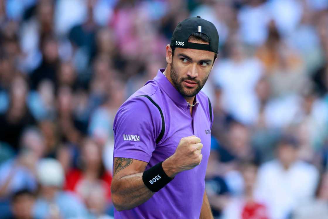 Matteo Berrettini of Italy celebrates winning the second set in the Men's Singles Second Round match