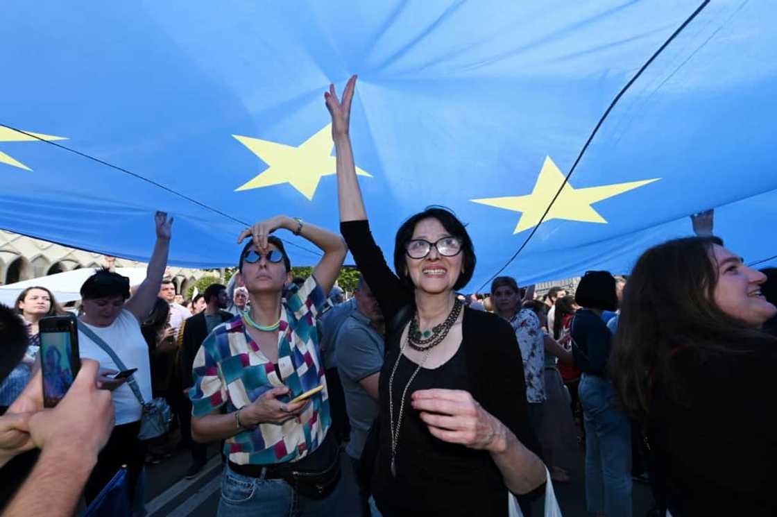 Tens of thousands of Georgians took to the streets in support of the country's EU candidacy Tens of thousands of Georgians took to the streets in support of the country's EU candidacy