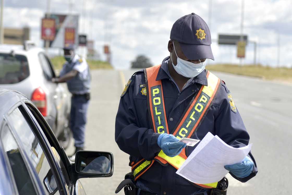 A police officer is conducting a routine operation A police officer is conducting a routine operation