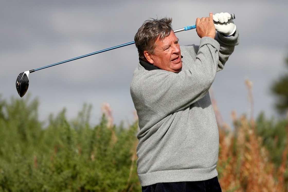 Johann Rupert playing golf Johann Rupert playing golf
