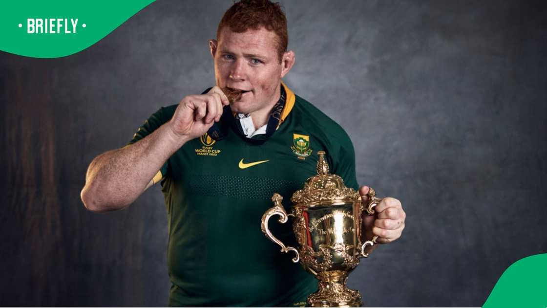 Steve Kitshoff with his Rugby World Cup medal and the trophy