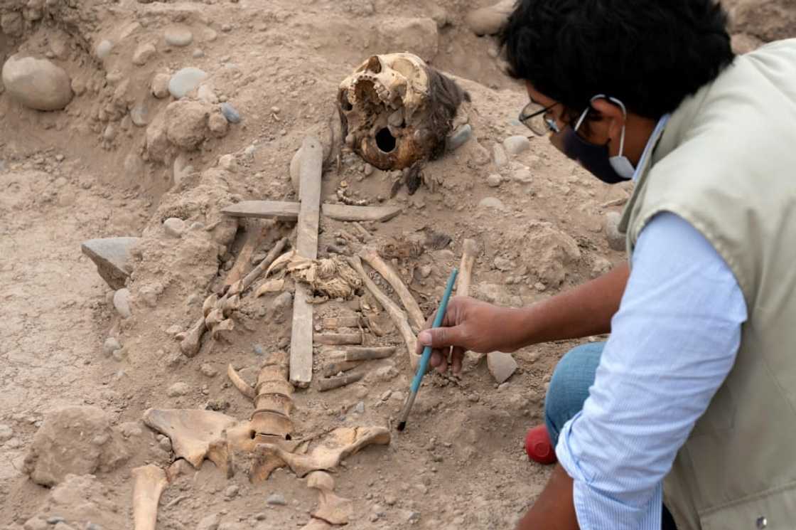Researchers said a wooden cross found at the site marked the region's shift to Christianity Researchers said a wooden cross found at the site marked the region's shift to Christianity
