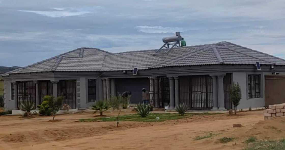 Man builds house for his mother Man builds house for his mother