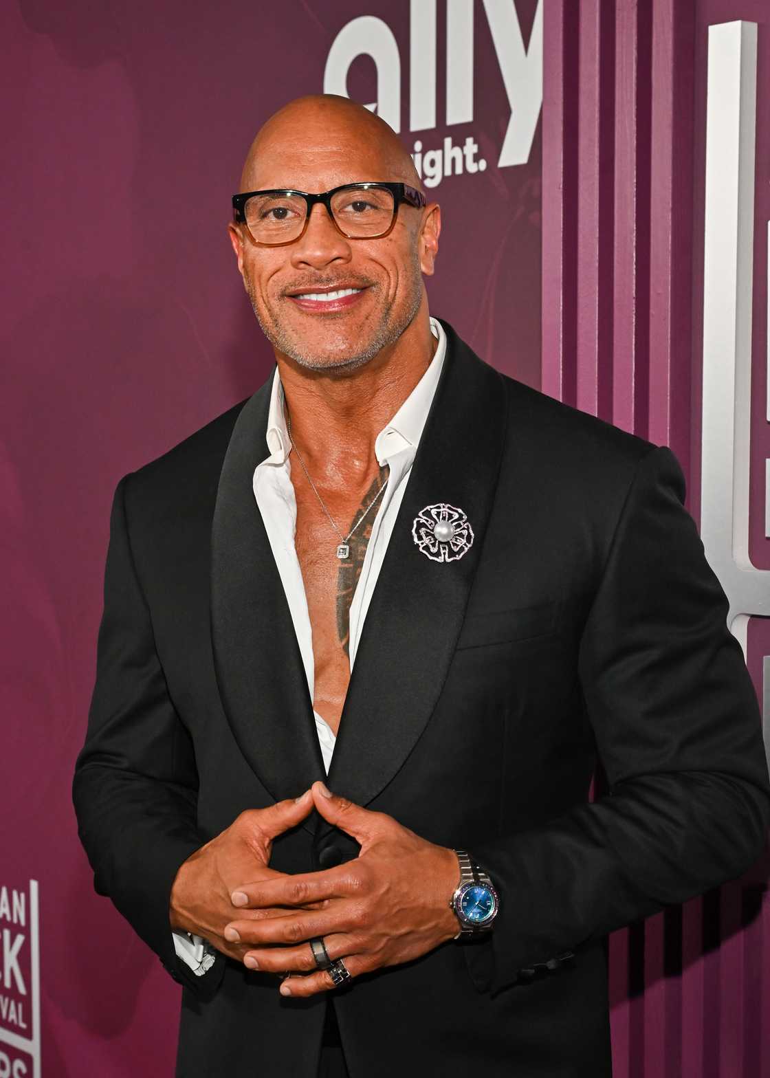 A fan broke down in tears after meeting The Rock