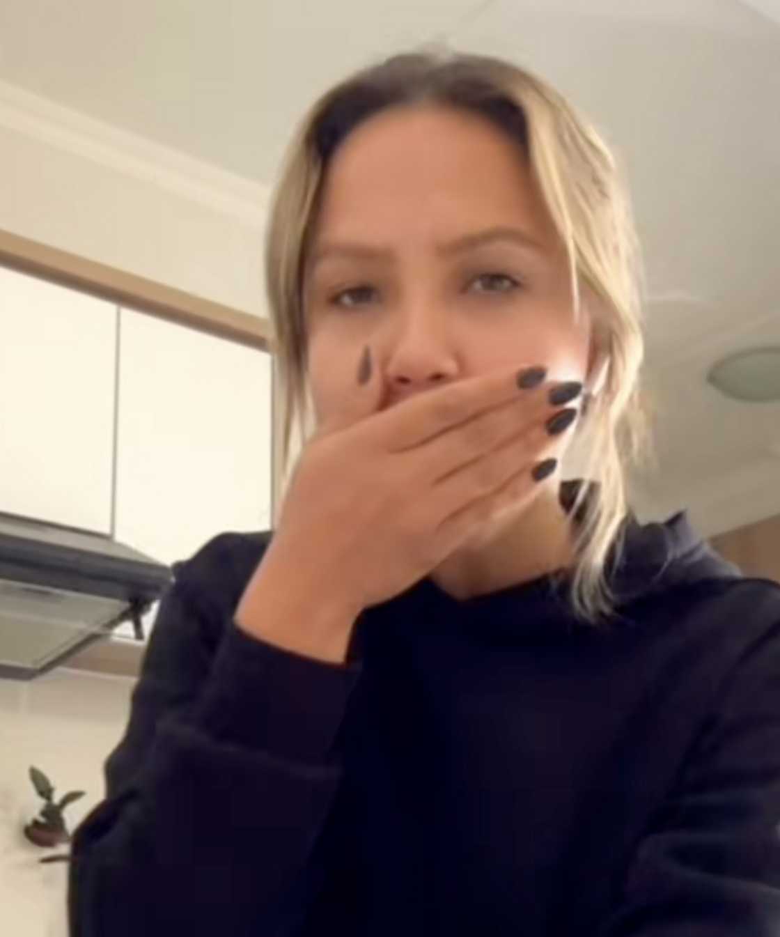 A photo of Kandisco in her apartment