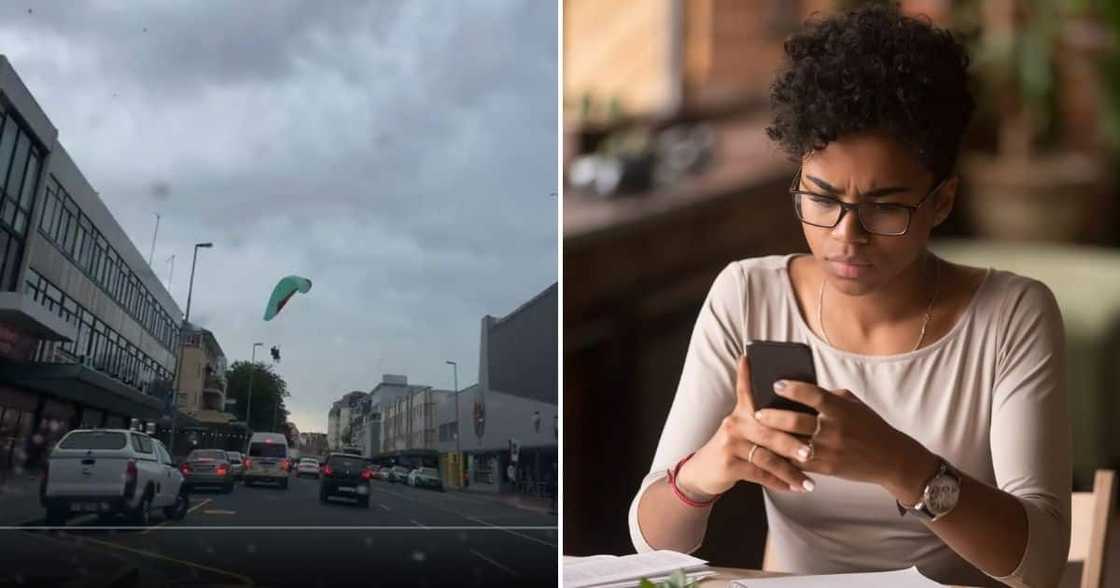 2 Paragliders land in Sea Point Main Road 2 Paragliders land in Sea Point Main Road