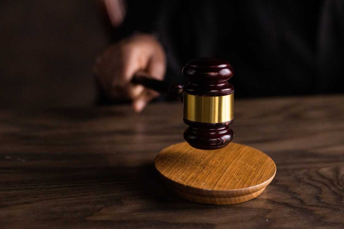 A wooden gavel on a table