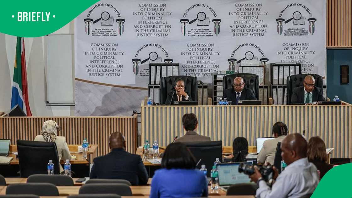 Commissioner Sesi Baloyi, Retired South African Constitutional Court Justice and former acting Deputy Chief Justice Mbuyiseni Madlanga and Commissioner Sandile Khumalo listen to evidence during the Madlanga Commission