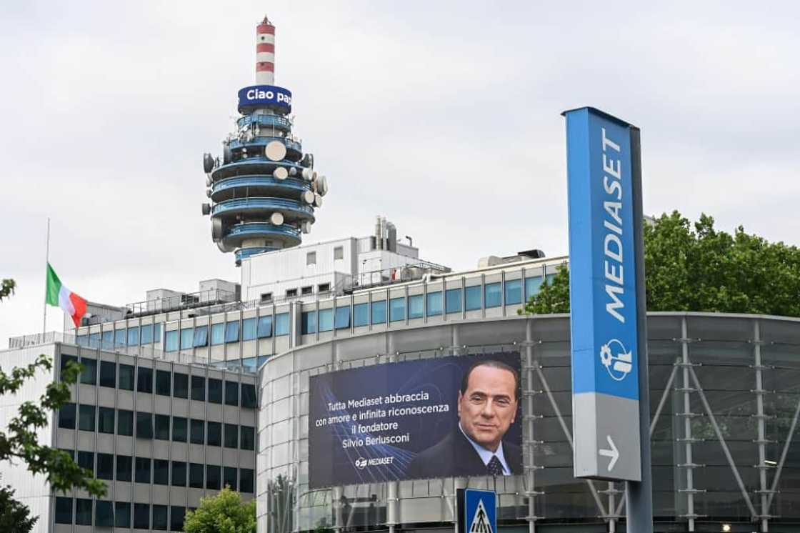 Silvio Berlusconi's portrait looms over the Mediaset HQ at Cologno Monzese outside Milan