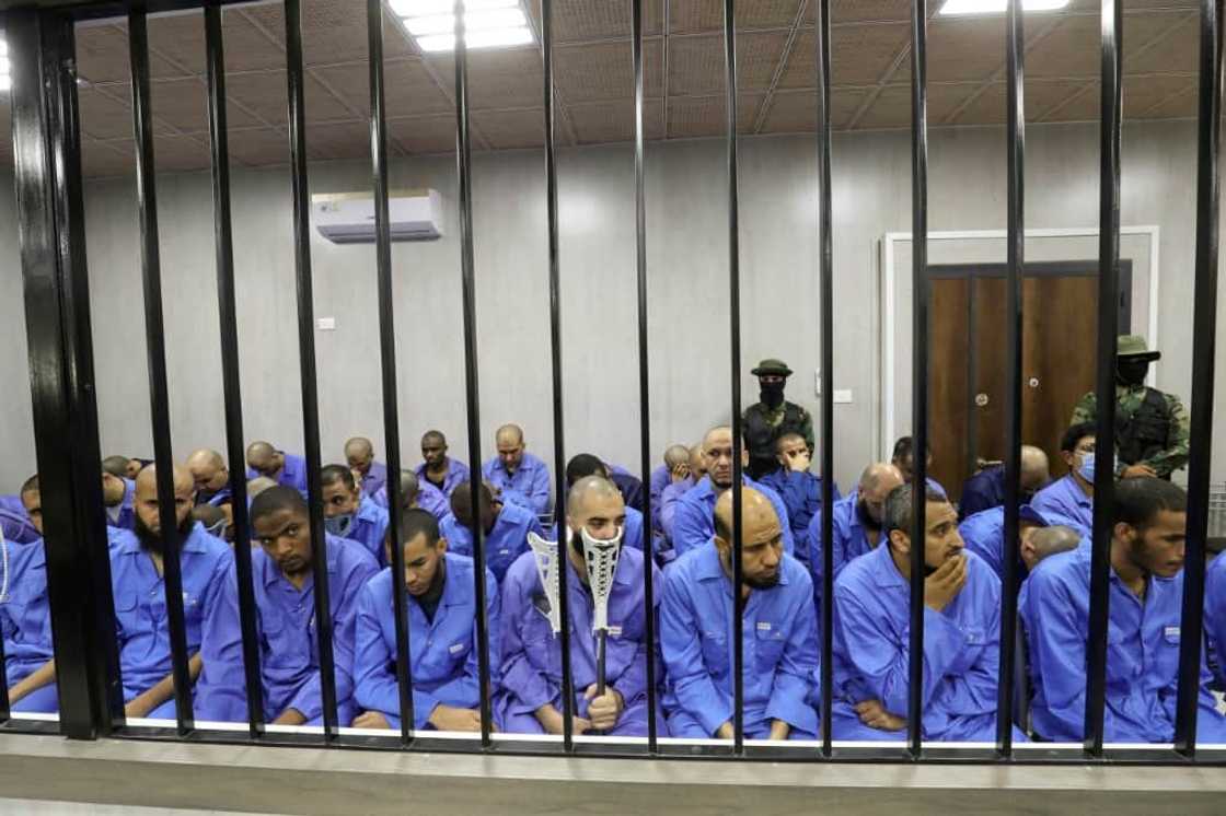 Suspected members of the Islamic State group sit in the dock during their trial in the western Libyan city of Misrata Suspected members of the Islamic State group sit in the dock during their trial in the western Libyan city of Misrata