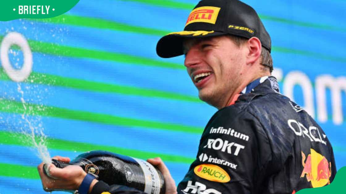 Max Verstappen celebrating on the podium Max Verstappen celebrating on the podium