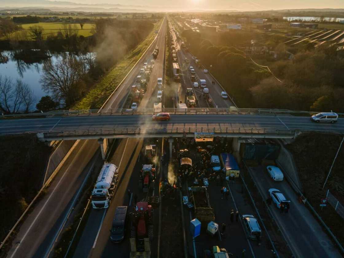 Farmers have been blocking roads including the A64 motorway in the southwest Farmers have been blocking roads including the A64 motorway in the southwest