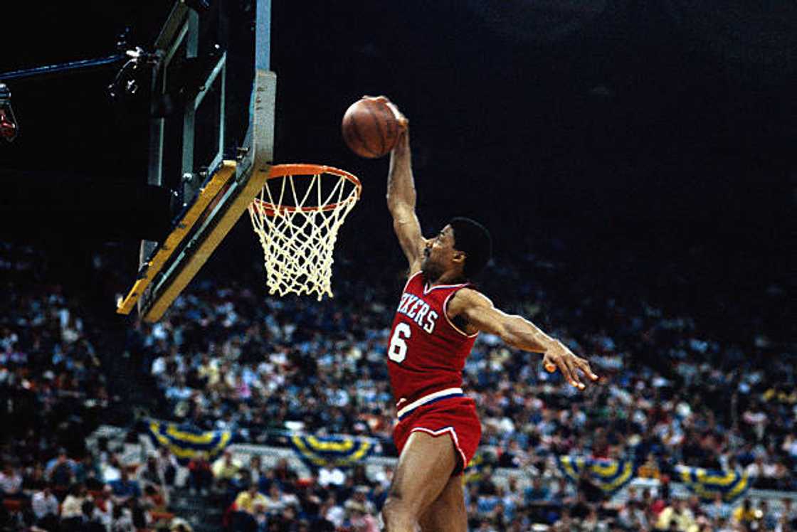 Philadelphia 76ers' Julius Erving making a basket