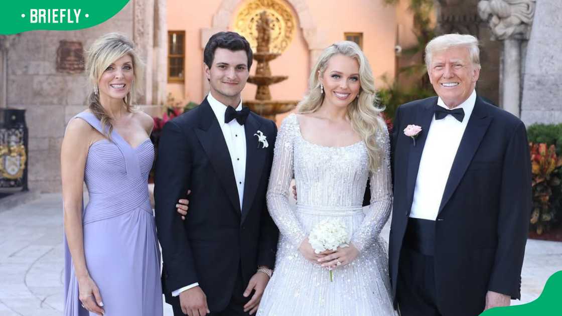 Melania Trump, Michael Boulos with his wife, Tiffany, and Donald Trump Melania Trump, Michael Boulos with his wife, Tiffany, and Donald Trump