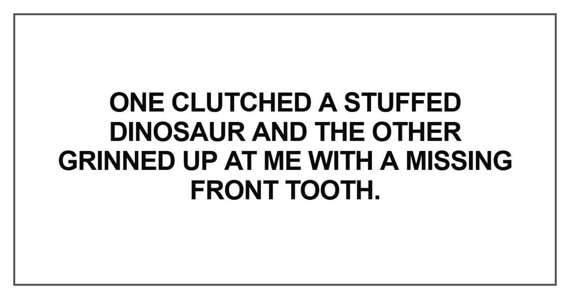 One clutched a stuffed dinosaur One clutched a stuffed dinosaur
