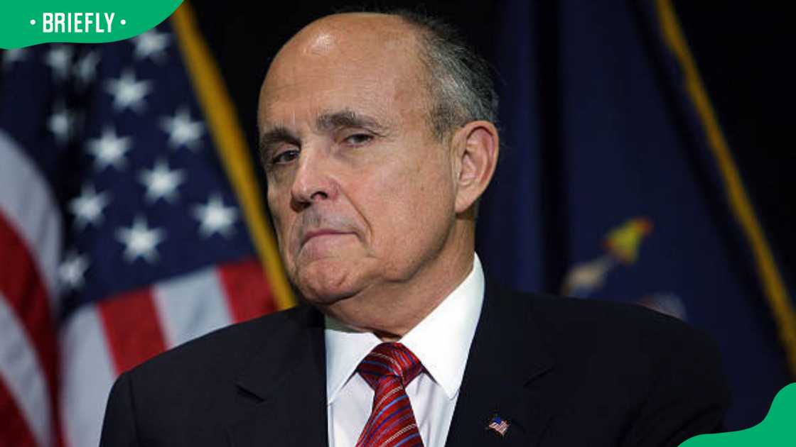 Rudy Giuliani at a news conference Rudy Giuliani at a news conference