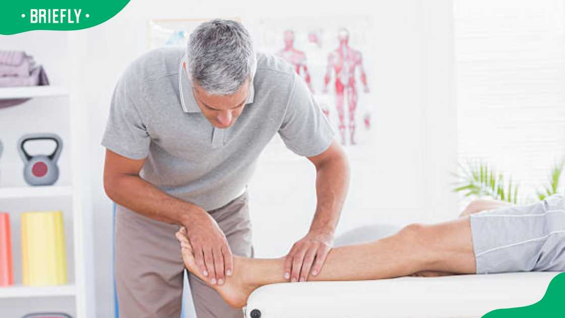 Man having leg massage Man having leg massage