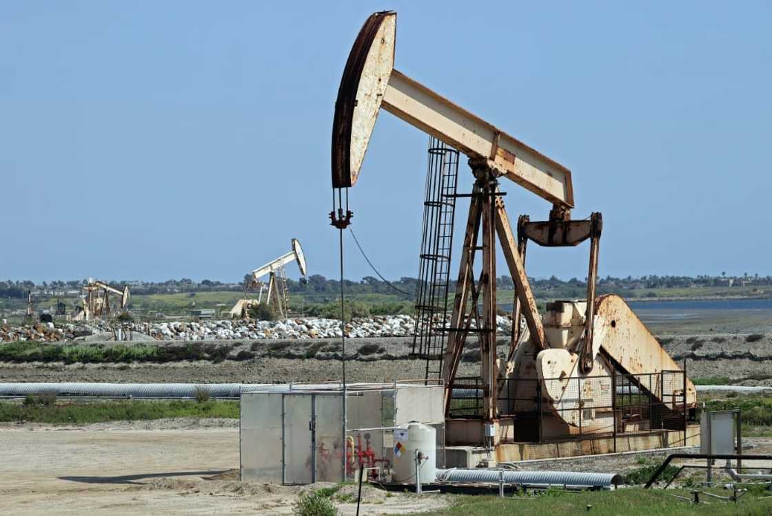 Oil prices have been hit by lower demand expectations owing to the prospect of higher interest rates Oil prices have been hit by lower demand expectations owing to the prospect of higher interest rates