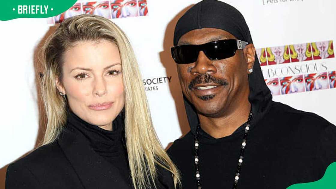 Paige Butcher and Eddie Murphy at the Debut Gallery Opening