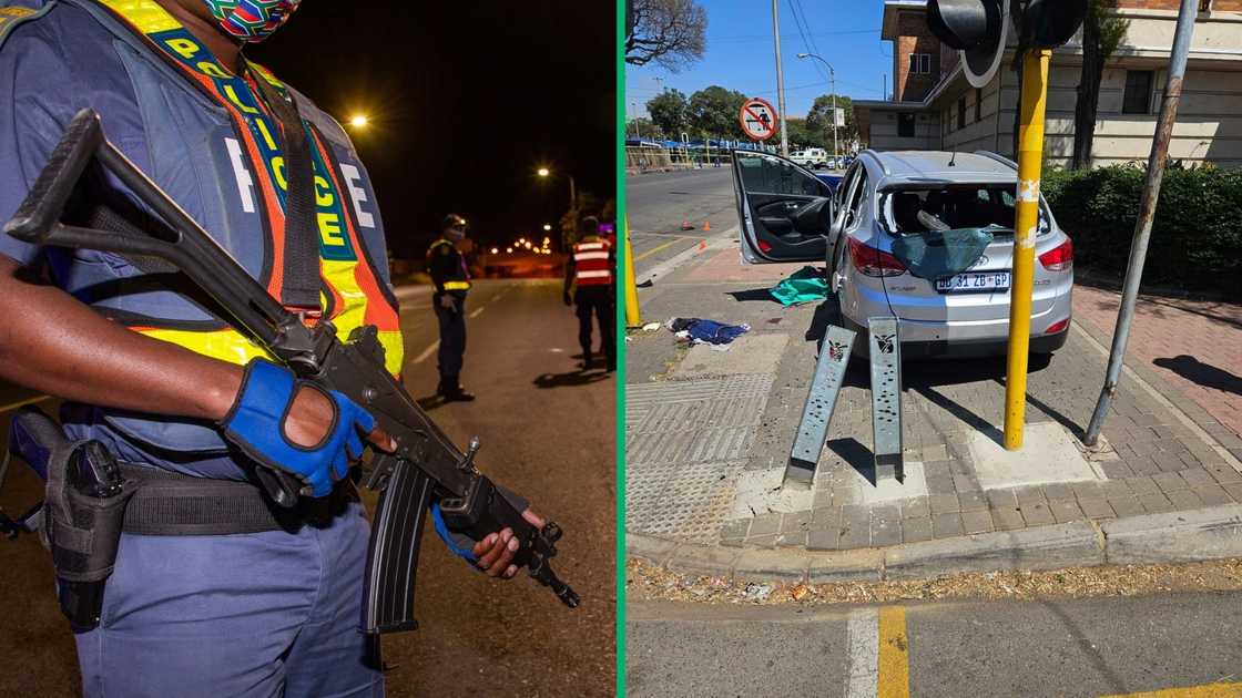 A police officer with his gun at a crime scene. Six robbers were fatally wounded after a shootout with law enforcement officials.