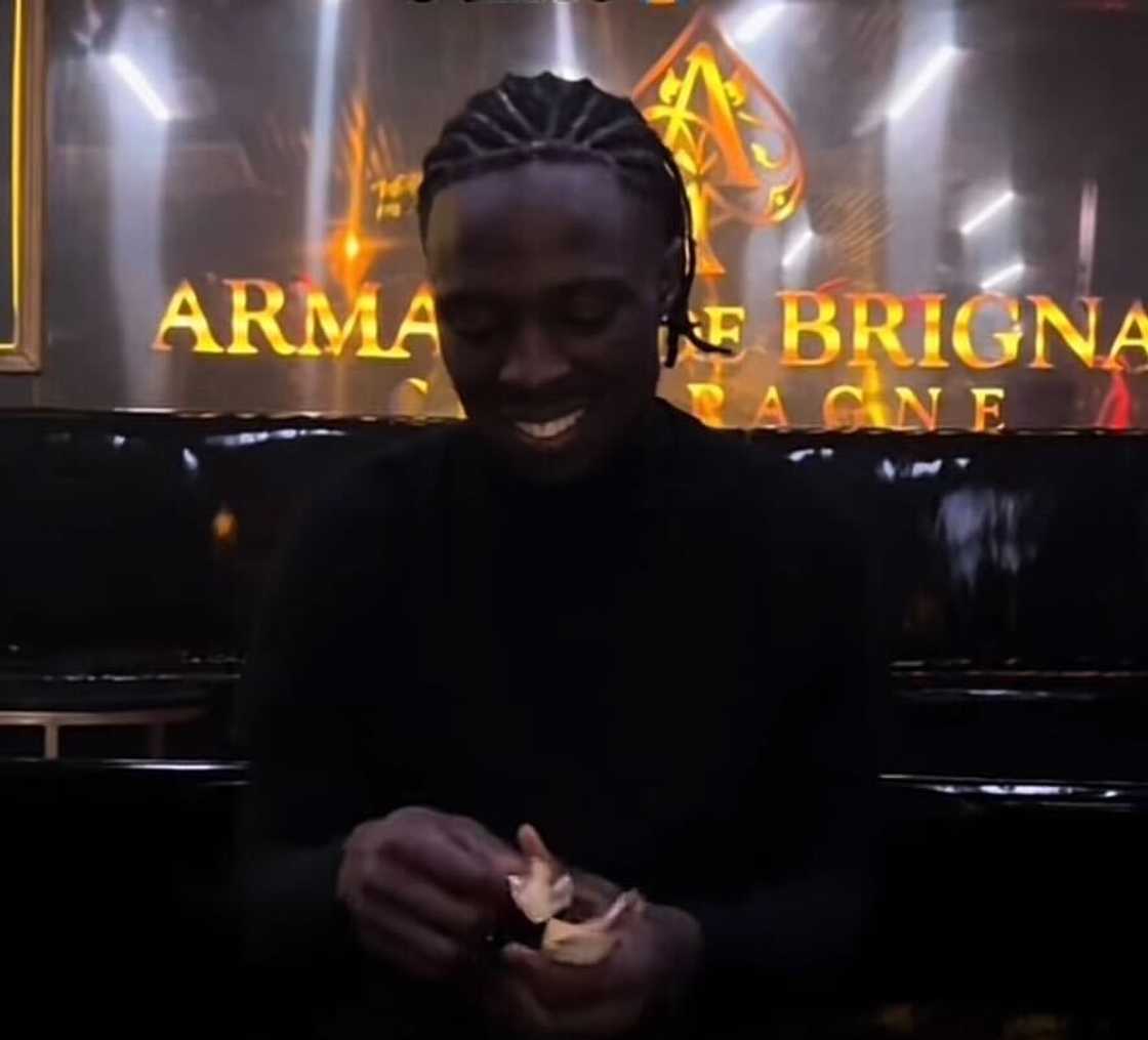 A cleaner at Saint Champagne Bar & Lounge in Cape Town ignited online debate while counting his stack of cash. A cleaner at Saint Champagne Bar & Lounge in Cape Town ignited online debate while counting his stack of cash.