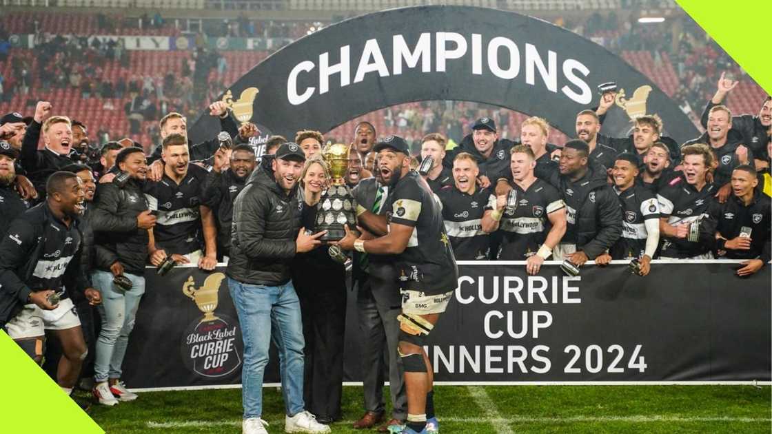 Hollywoodbets Sharks XV lift the Currie Cup after defeating Fidelity ADT Lions in the final on Saturday, September 21, 2024. Photo: Briefly News/ Willem Loock.