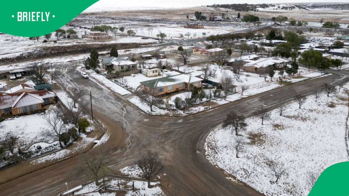 This aerial view taken on September 21, 2024, shows snow covering the town of Warden, Free State province, South Africa This aerial view taken on September 21, 2024, shows snow covering the town of Warden, Free State province, South Africa