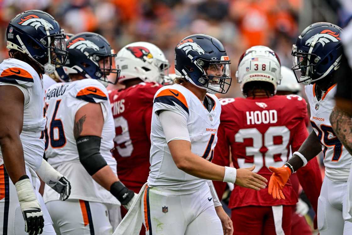 Arizona Cardinals and Denver Broncos players Arizona Cardinals and Denver Broncos players