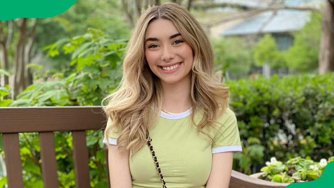 Sommerset posing for a picture in a green t-shirt. Sommerset posing for a picture in a green t-shirt.