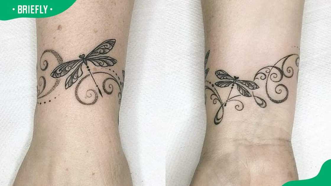 Girly dragonfly bracelet tattoo Girly dragonfly bracelet tattoo