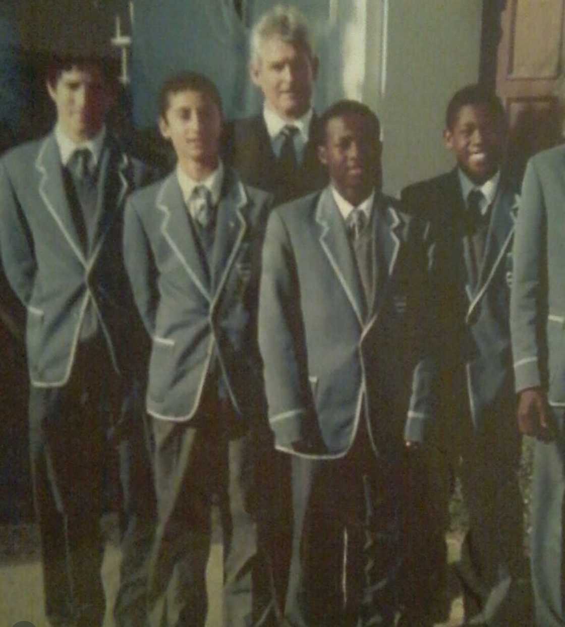 Siya Kolisi with some of his old teammates at Grey Boys High School Siya Kolisi with some of his old teammates at Grey Boys High School