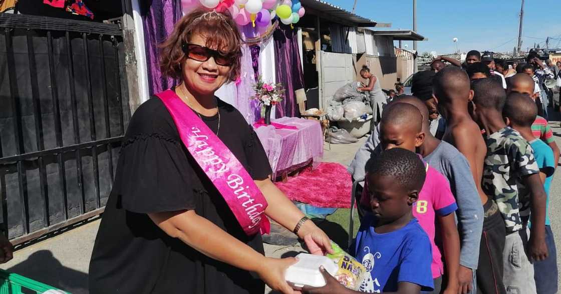 A lady from Cape Town filling hungry tummies on her birthday. A lady from Cape Town filling hungry tummies on her birthday.