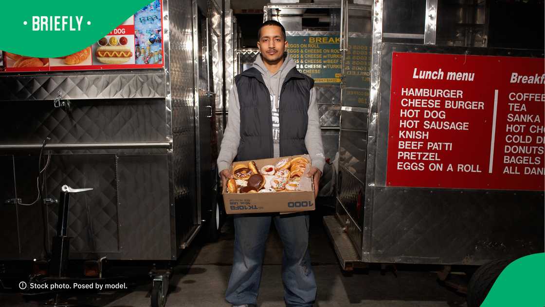 The gent is always hustling by selling tasty treats. The gent is always hustling by selling tasty treats.