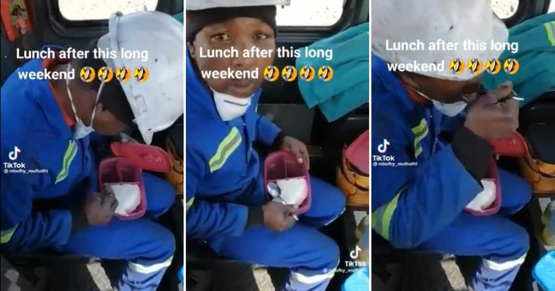 A man eating his dry pap as his friend laughs at him A man eating his dry pap as his friend laughs at him