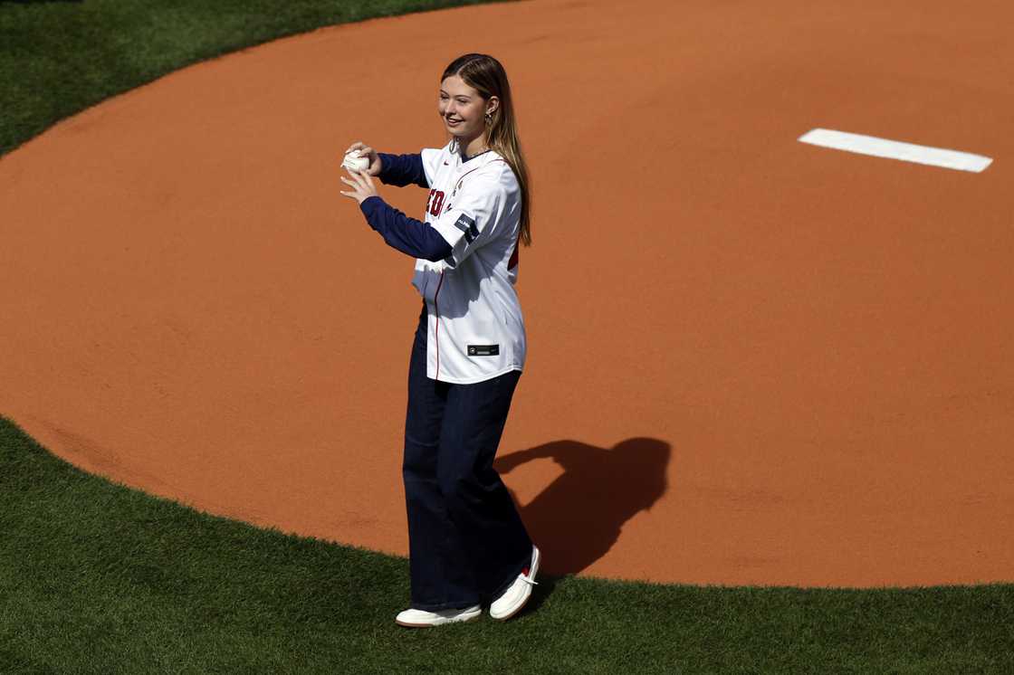 Brianna Wakefield throwing the first pitch