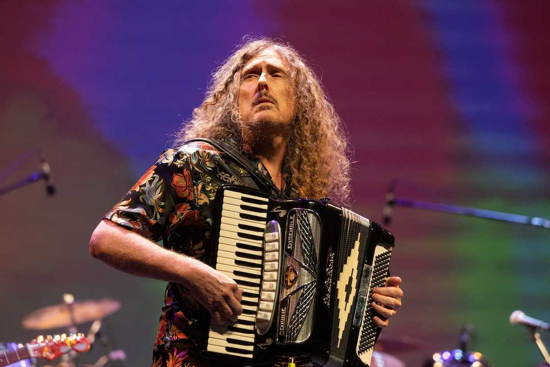 Comedy musician Weird Al performing on stage Comedy musician Weird Al performing on stage