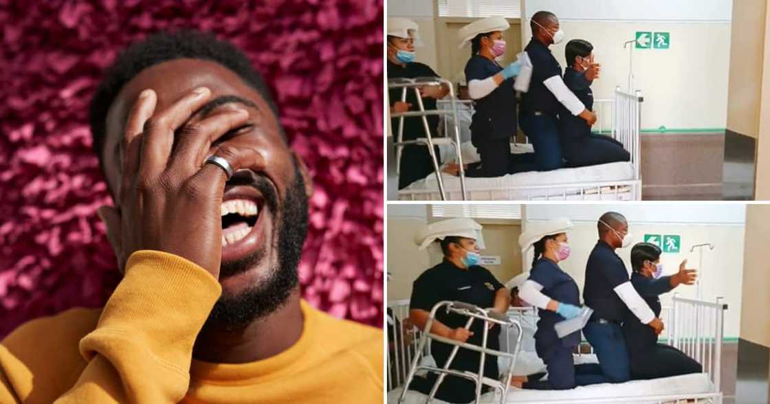 Man laughing ta hospital staff acting out Titanic Man laughing ta hospital staff acting out Titanic