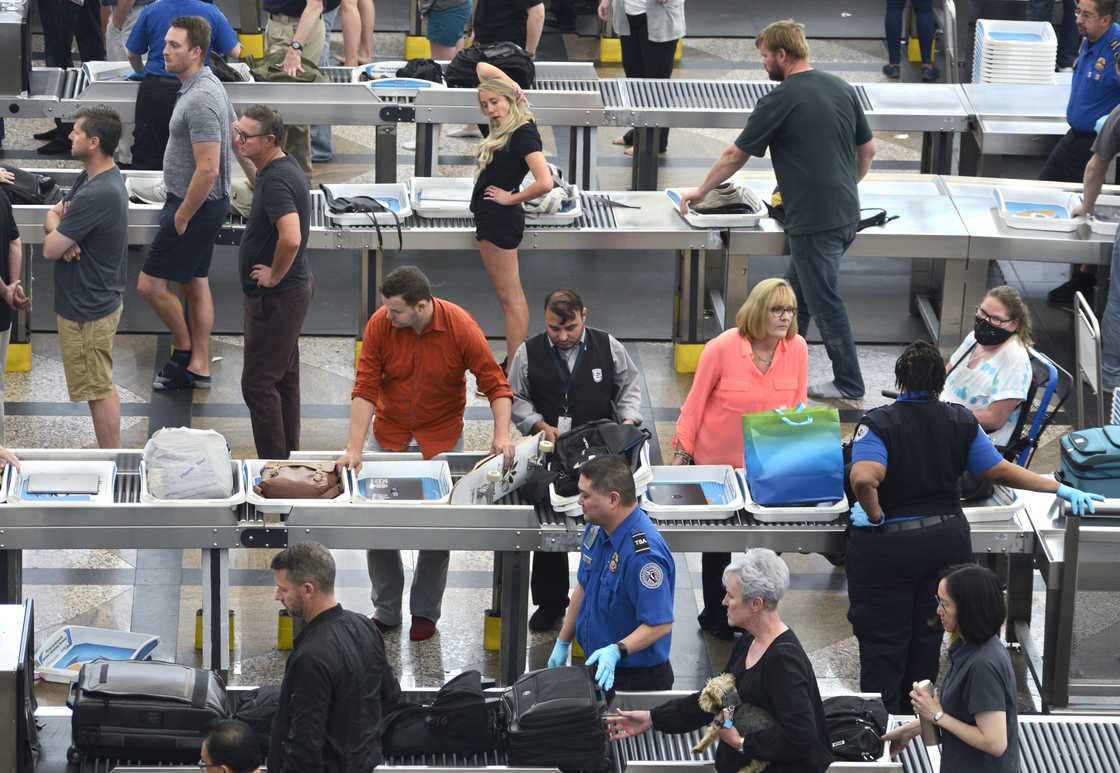 Airplane passengers at Denver International Airport Airplane passengers at Denver International Airport
