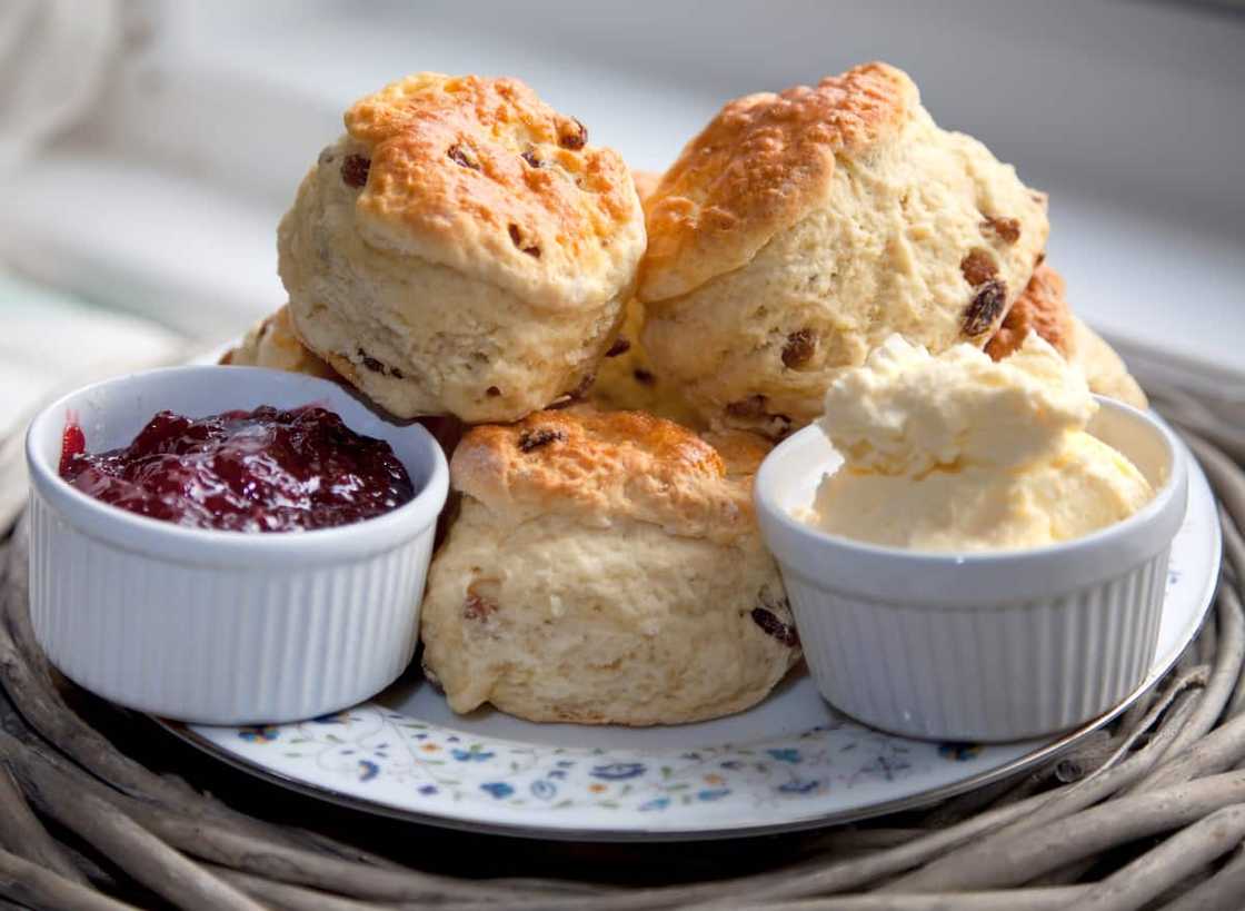 Scones served with cream and jam Scones served with cream and jam